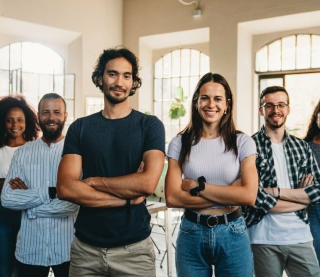 Professional team smiling in office setting.